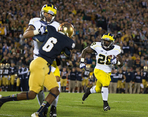 Jerald Robinson (83) and Fitzgerald Toussaint (28)