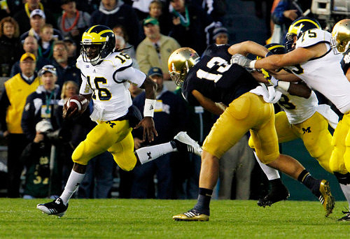 Denard Robinson (16) and Michael Schofield (75)