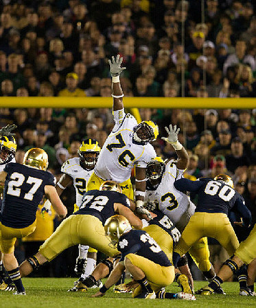 Kenny Demens (25), Quinton Washington (76),  and William Campbell (73)