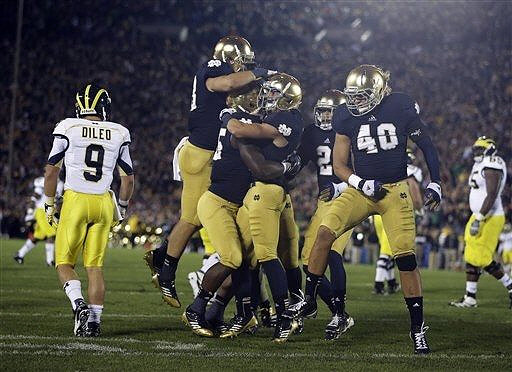 Drew Dileo (9) and Patrick Omameh (65)