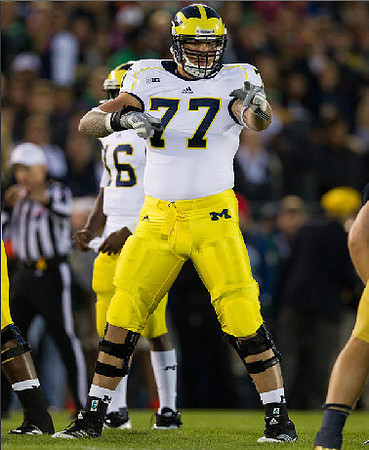 Denard Robinson (16) and Taylor Lewan (77)