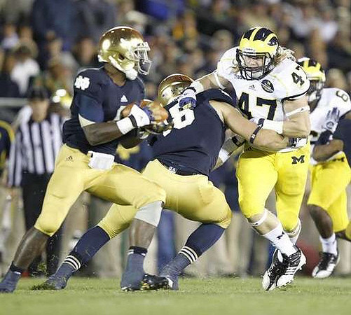 Jake Ryan (47) and Raymon Taylor (6)