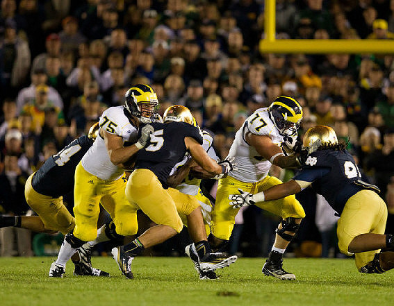 Michael Schofield (75) and Taylor Lewan (77)