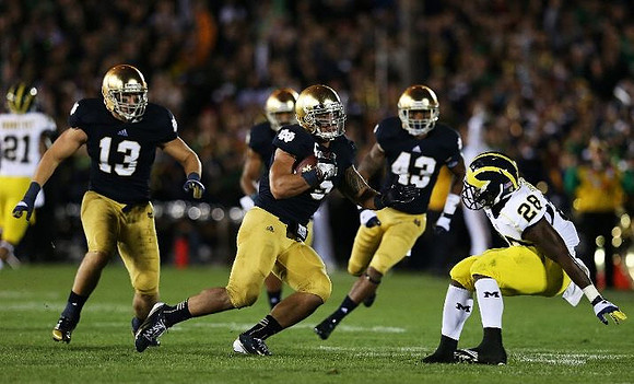 Fitzgerald Toussaint (28) and Roy Roundtree (21)
