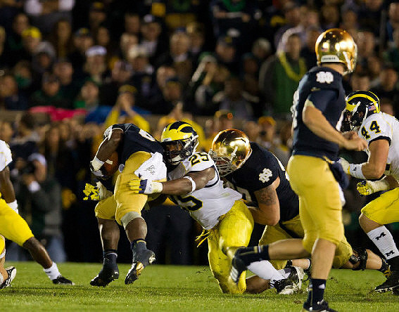 Kenny Demens (25) and Desmond Morgan (44)