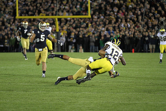 Devin Gardner (12) and Dennis Norfleet (26)