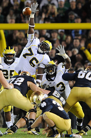 Kenny Demens (25), Quinton Washington (76), and William Campbell (73)