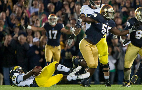 Denard Robinson (16) and Michael Schofield (75)