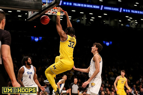 Tarris Reed Jr. (32) and Joey Baker (15)