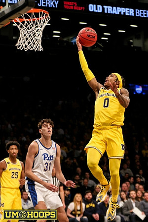 Jace Howard (25) and Dug McDaniel (0)