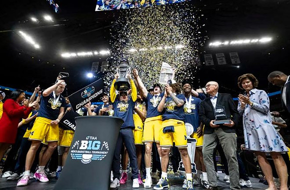Dusty May, Michigan Team, and Big Ten Tournament Championship Trophy