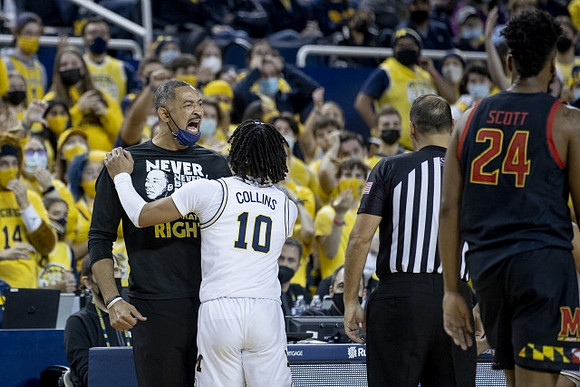 Juwan Howard and Frankie Collins (10)