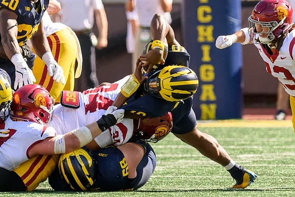 Josh Priebe (68), Alex Orji (10), and Kalel Mullings (20)