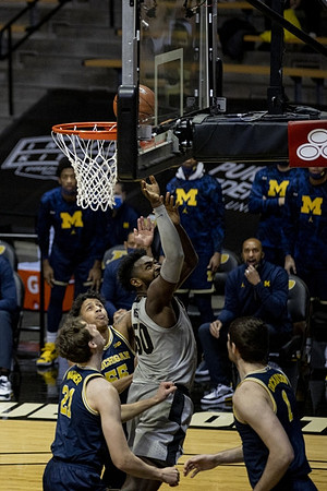 Franz Wagner (21), Eli Brooks (55), and Hunter Dickinson (1)