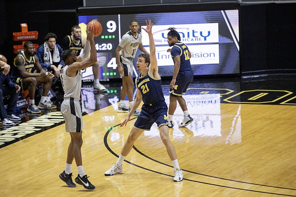 Franz Wagner (21) and Mike Smith (12)