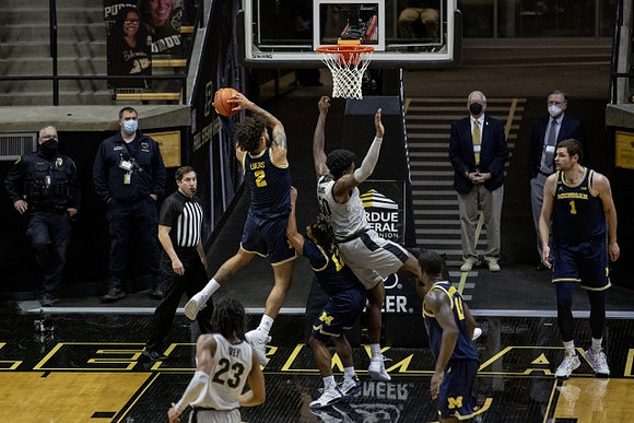 Isaiah Livers (2), Mike Smith (12), Chaundee Brown Jr. (15), and Hunter Dickinson (1)