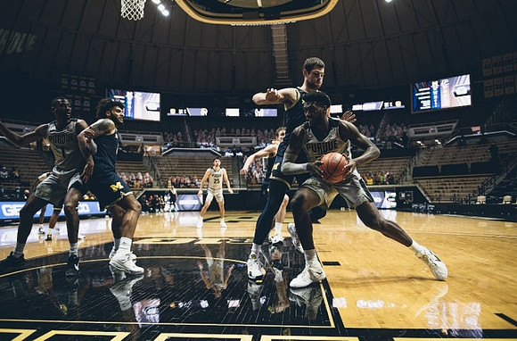 Isaiah Livers (2), Franz Wagner (21), and Hunter Dickinson (1)