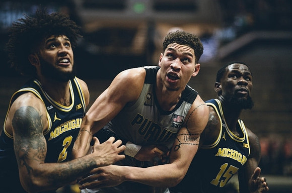 Isaiah Livers (2) and Chaundee Brown Jr. (15)