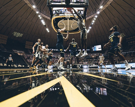 Franz Wagner (21), Isaiah Livers (2), Austin Davis (51), Chaundee Brown Jr. (15), and Mike Smith (12)