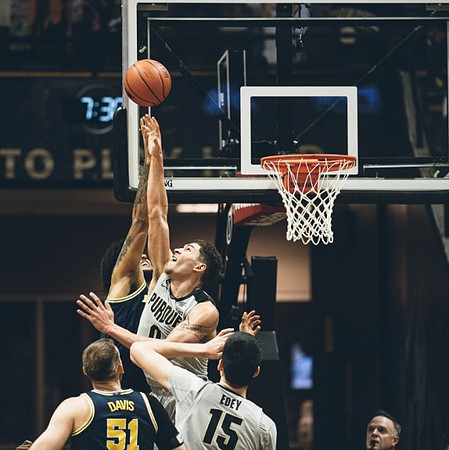 Austin Davis (51) and Isaiah Livers (2)