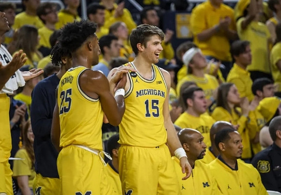 Jace Howard (25), Joey Baker (15), Saddi Washington, and Howard Eisley