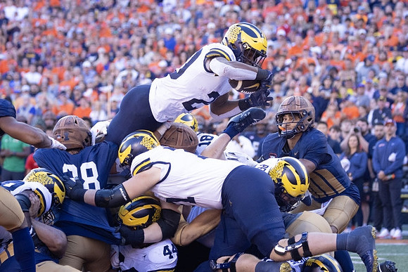 Max Bredeson (44), Evan Link (71), Colston Loveland (18), Josh Priebe (68), and Kalel Mullings (20)