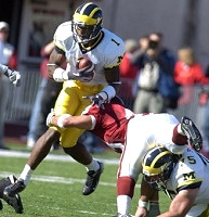 Braylon Edwards (1) and David Baas (75)