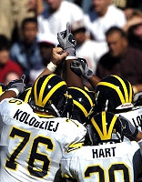 Mike Kolodziej (76), Jake Long (77), and Michael Hart (20)