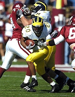 Michael Hart (20) and Jake Long (77)