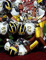 Jermaine Gonzales (18), Tim Massaquoi (88), and Michael Hart (20)