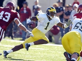 Braylon Edwards (1) and Leo Henige (65)