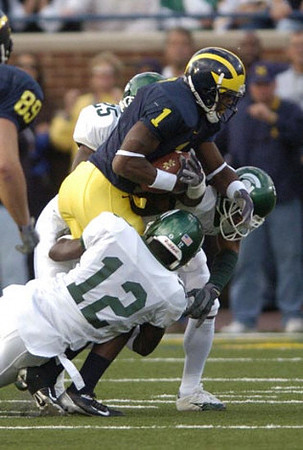 Braylon Edwards (1) and Tyler Ecker (89)