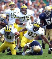 Chris Perry (23), John Navarre (16), David Baas (75), and Tyrece Butler (9)