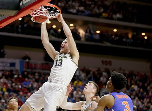 Ignas Brazdeikis (13) and Jon Teske (15)