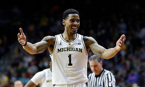 Charles Matthews (1) and Zavier Simpson (3)