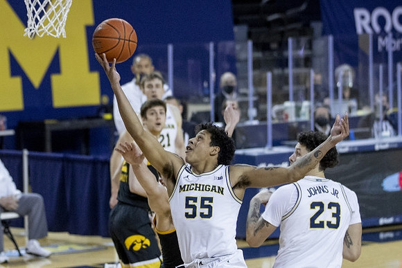 Eli Brooks (55) and Brandon Johns Jr. (23)