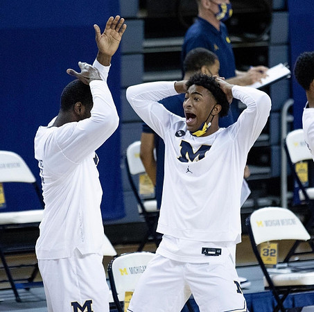 Chaundee Brown Jr. (15) and Jace Howard (25)