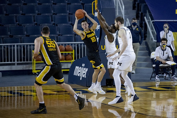 Chaundee Brown Jr. (15) and Hunter Dickinson (1)