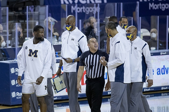 Chaundee Brown Jr. (15) and Juwan Howard