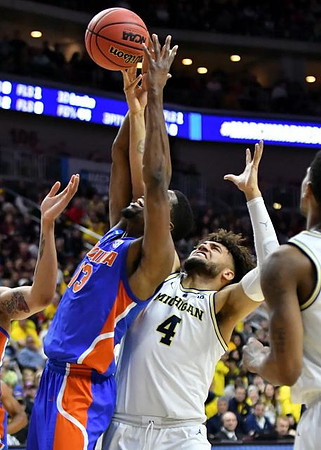 Isaiah Livers (4) and Charles Matthews (1)