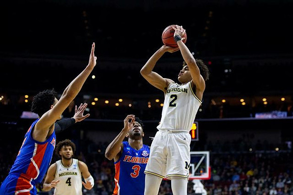 Isaiah Livers (4) and Jordan Poole (2)