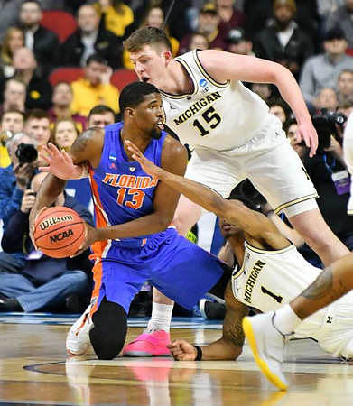 Jon Teske (15) and Charles Matthews (1)