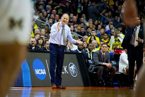 John Beilein, Luke Yaklich, and Saddi Washington