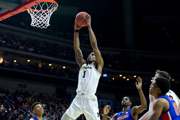 Charles Matthews (1) and Jon Teske (15)