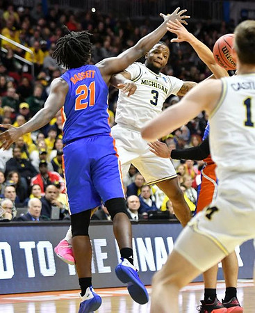 Zavier Simpson (3) and Colin Castleton (11)