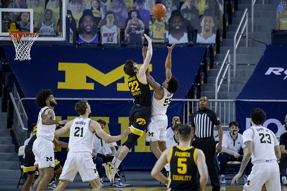 Isaiah Livers (2), Franz Wagner (21), Eli Brooks (55), and Brandon Johns Jr. (23)