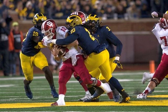 Kwity Paye (19), Devin Bush (10), and Rashan Gary (3)