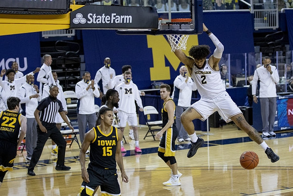 Isaiah Livers (2) and Chaundee Brown Jr. (15)