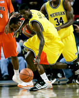 Manny Harris (3) and DeShawn Sims (34)
