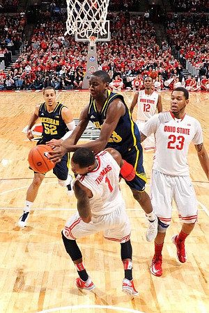 Jordan Morgan (52) and Caris LeVert (23)